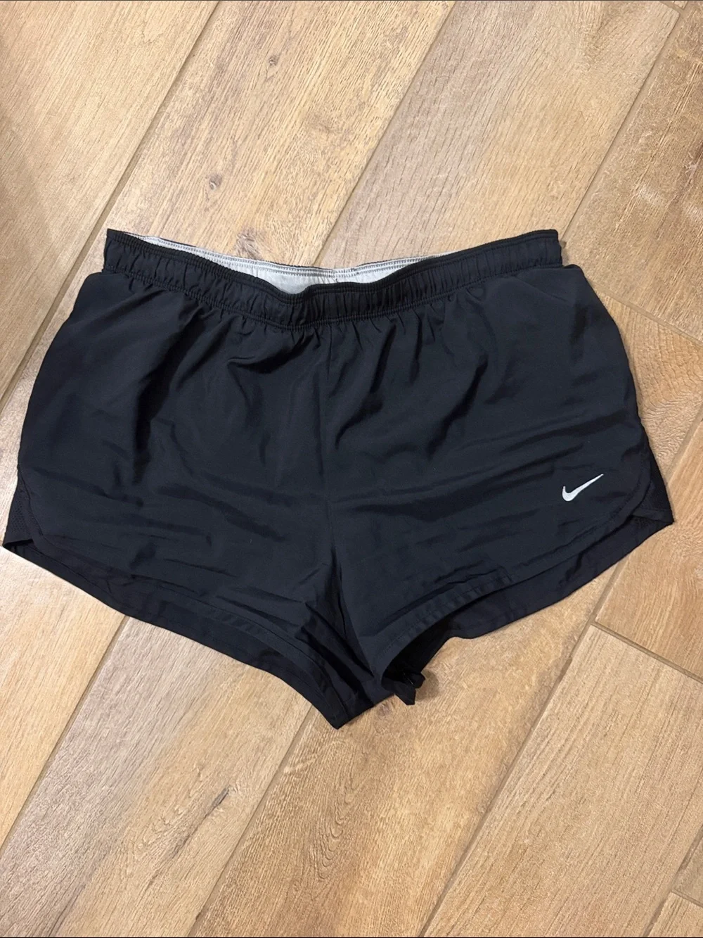 Nike Women's Black Athletic Running Shorts with White Swoosh